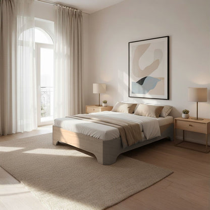 Canapé abatible de madera Milán color ártico con colchón y ropa de cama junto a dos mesitas