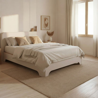 Canapé abatible de madera Milán color blanco con colchón y ropa de cama en un dormitorio